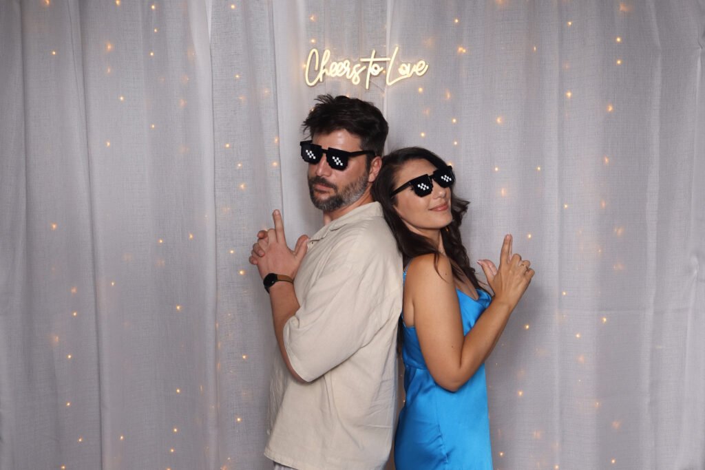 photobooth party guests with funny glasses