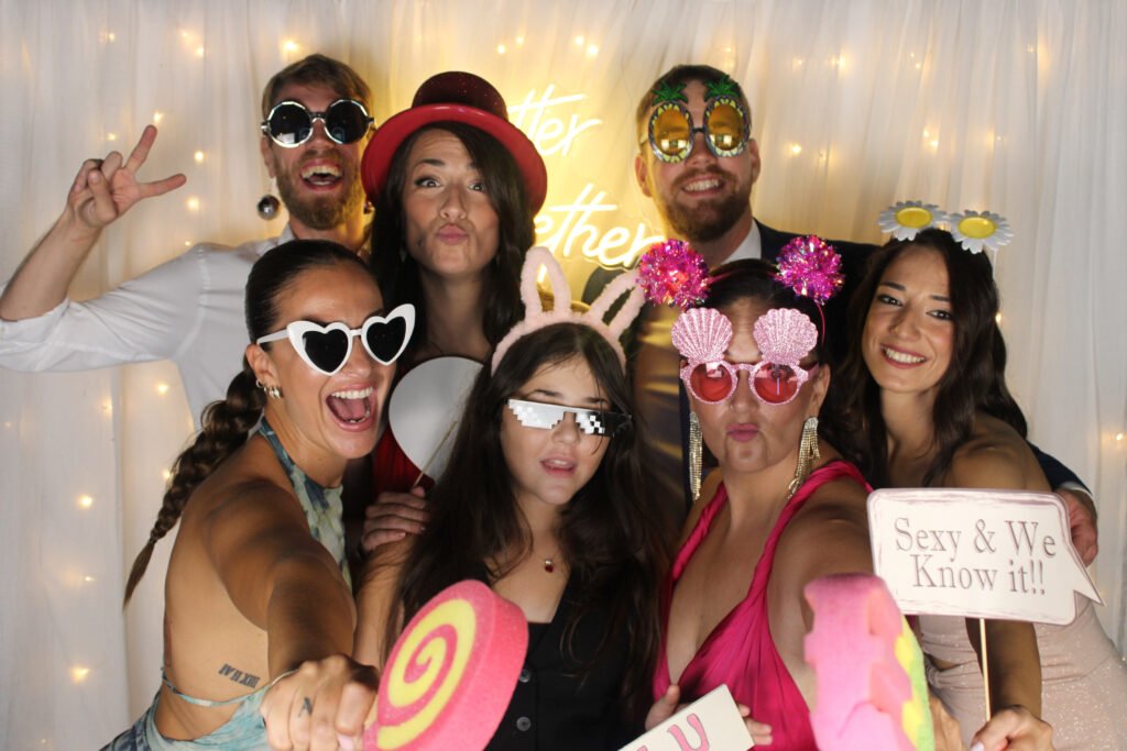 photobooth party guests with funny glasses